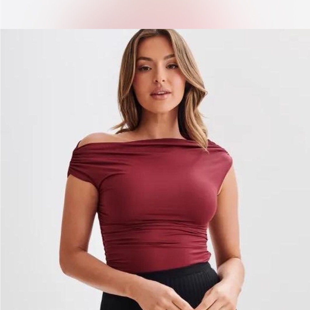Meshki Alayna Recycled Nylon Ruched Top in a beautiful burgundy color